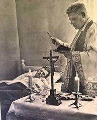 Priest giving Extreme Unction to a bedridden man